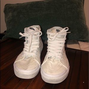 All white Vans high top